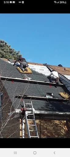 Rhode Island roof installation crew working on a residential property